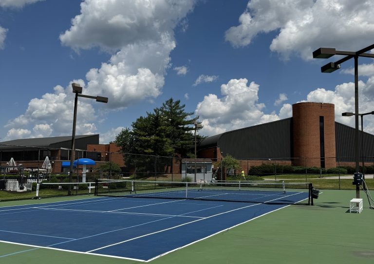 Outdoor tennis courts on a sunny day